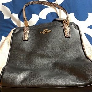 Black, white, & snakeskin leather Coach handbag.